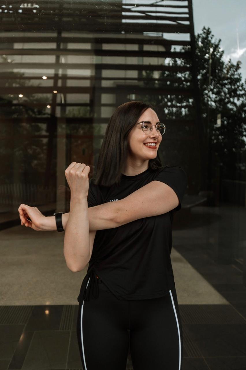 Jani demonstrating a stretching exercise